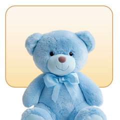 Plush teddy bears, toy blocks, and gift boxes on a light rug in a festive toy room setting