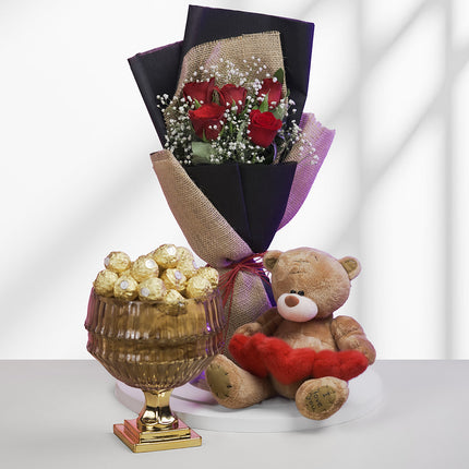 Gift set with red rose bouquet, teddy bear, and Ferrero Rocher chocolates