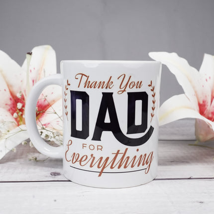 Thank you dad mug with lilies on wooden surface, Father's Day gift idea