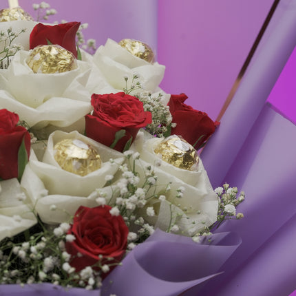 Ferrero Rocher chocolate and red rose bouquet with white baby's breath in purple wrapping